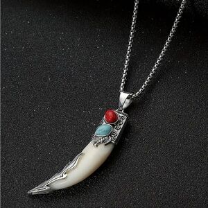 Silver Pendant Necklace with Red and Blue Accents.